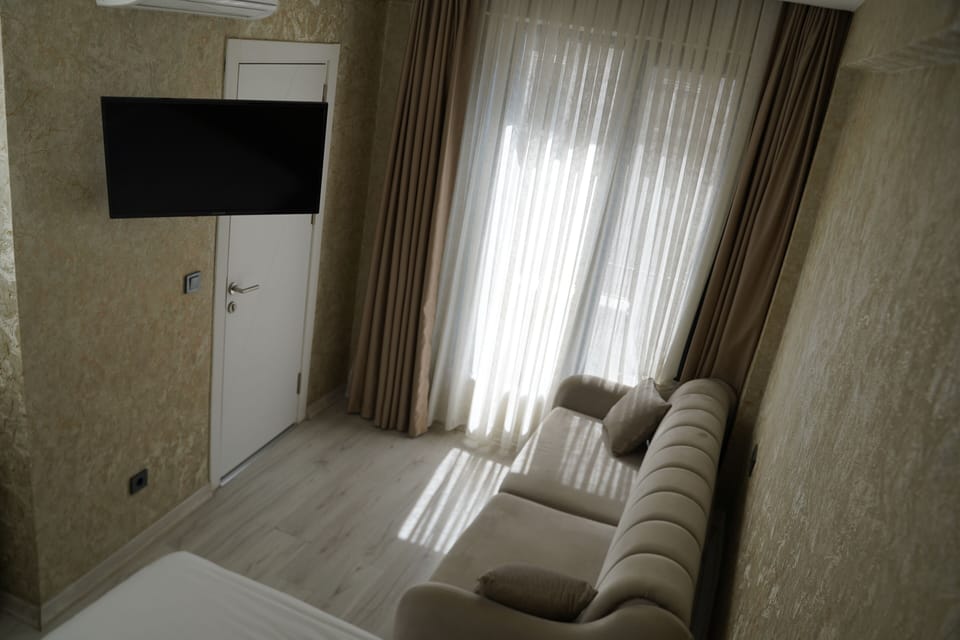 Superior Triple Room | Hypo-allergenic bedding, minibar, laptop workspace, free WiFi