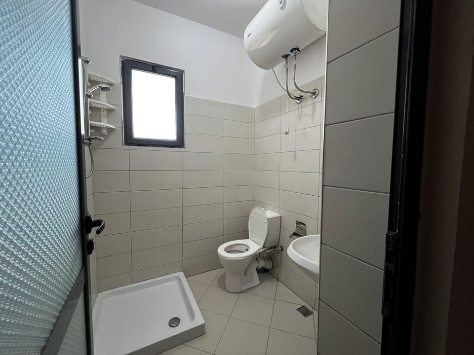Triple Room, Garden View | Bathroom | Shower, hair dryer, towels, soap