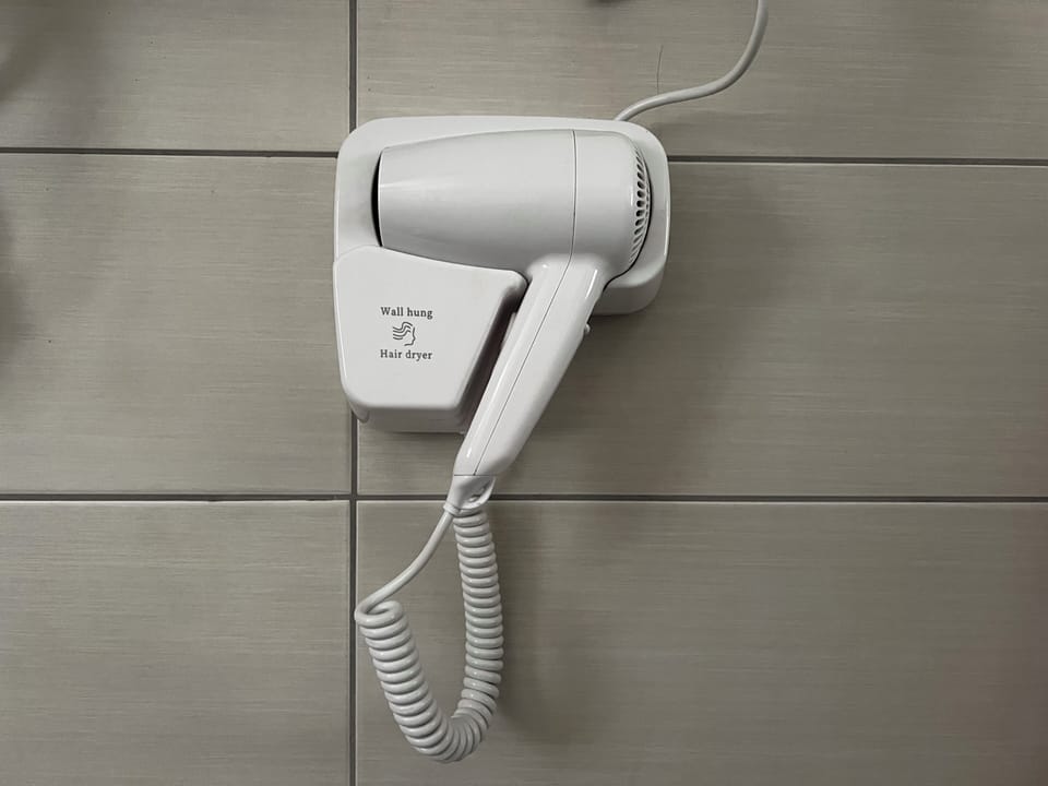 Triple Room, Garden View | Bathroom | Shower, hair dryer, towels, soap