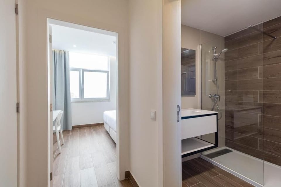 Apartment, 1 Bedroom, Balcony, Pool View | Minibar, in-room safe, desk, laptop workspace