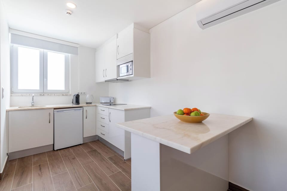 Mini-fridge, microwave, stovetop, espresso maker