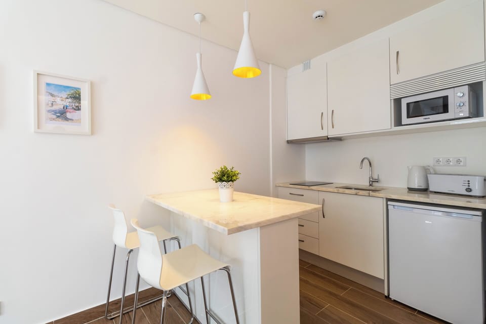 Mini-fridge, microwave, stovetop, espresso maker