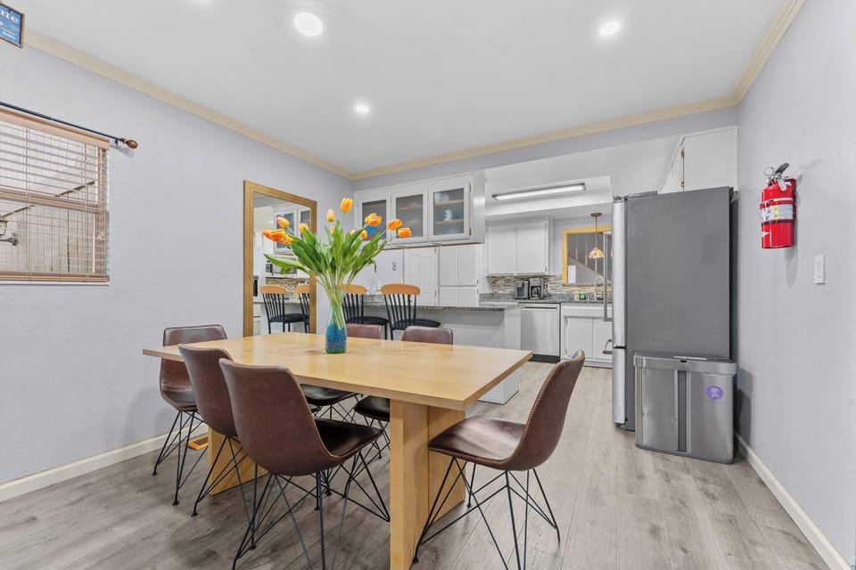Dining table for 6 guests and kitchen 3 bar top chairs.  High chair