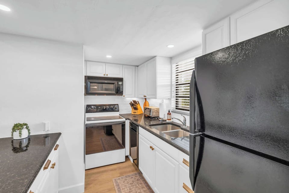 The kitchen faces to the front of the condo with a window for extra light 
