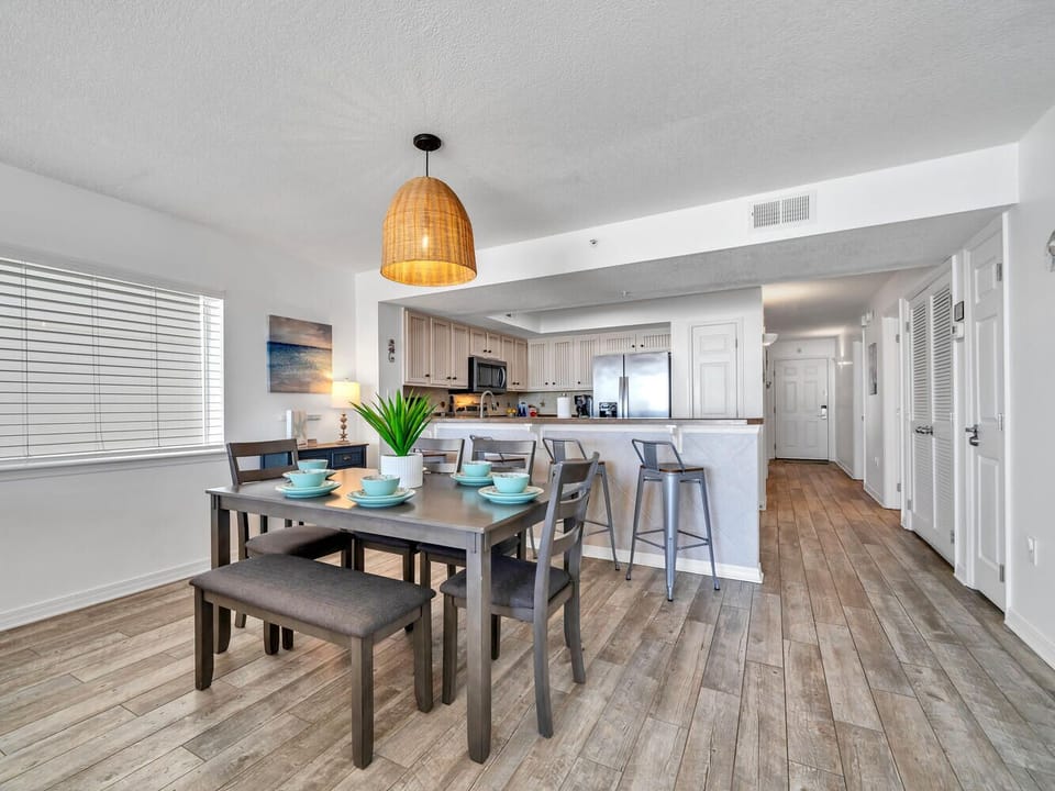 Your open-concept living space combines elegant dining and modern kitchen, perfect for gathering with loved ones over home-cooked meals.