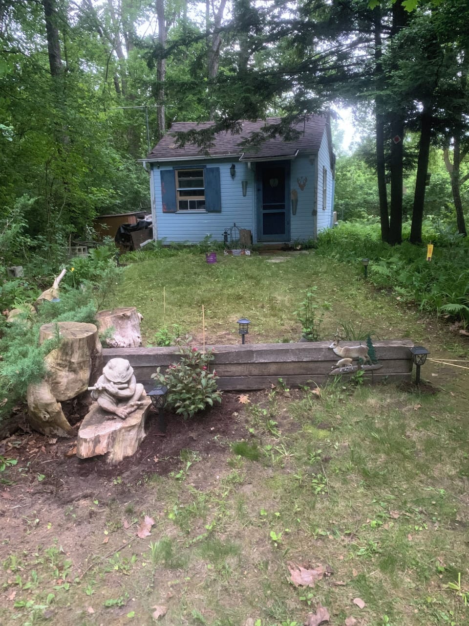 Parking here for two vehicles in front of the cabin.