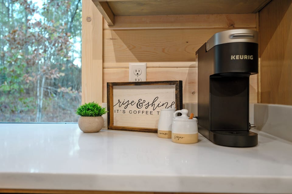 Start your mornings at the Early Bird with a cup of coffee at this convenient coffee nook, featuring a Keurig and all your coffee-making essentials.