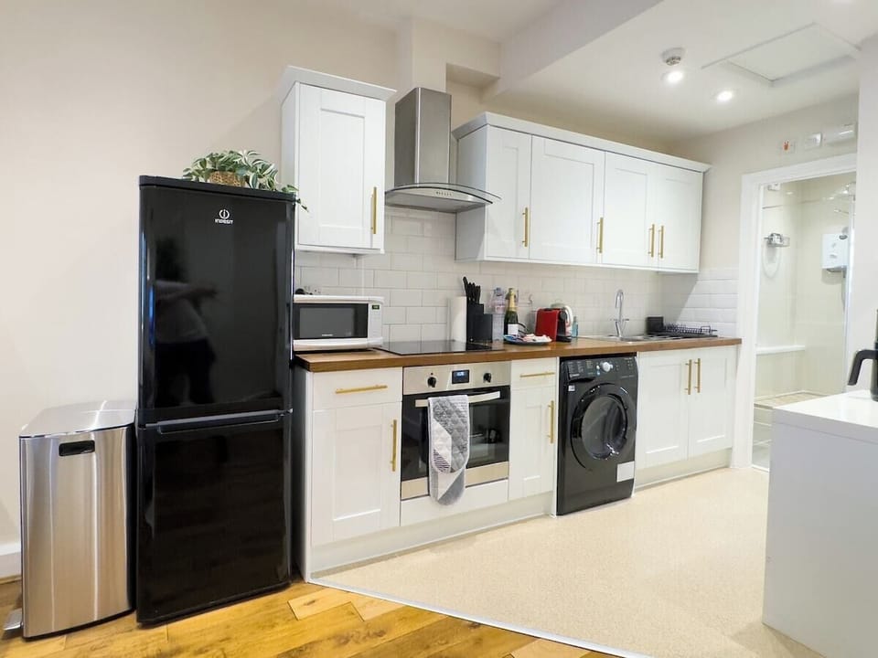Full Kitchen compromising of fridge, oven, microwave, washer, kettle, air fryer & espresso machine 