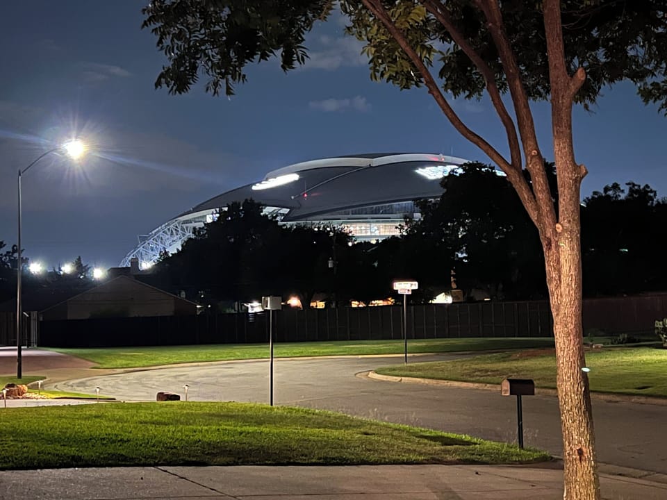 Stadium views from the front yard at night