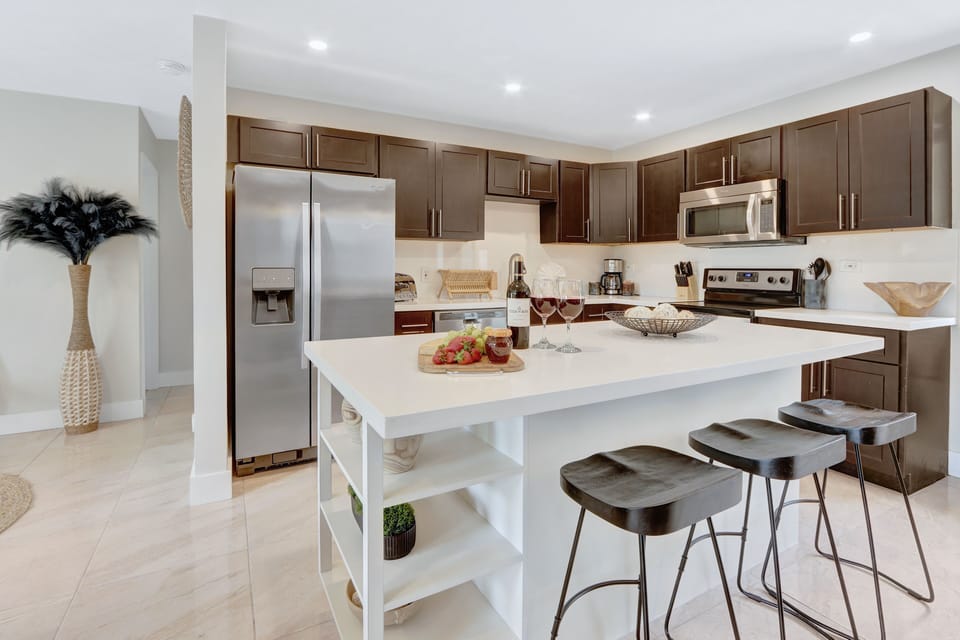Kitchen | Fully stocked with all the essentials and modern appliances. Counter seating.