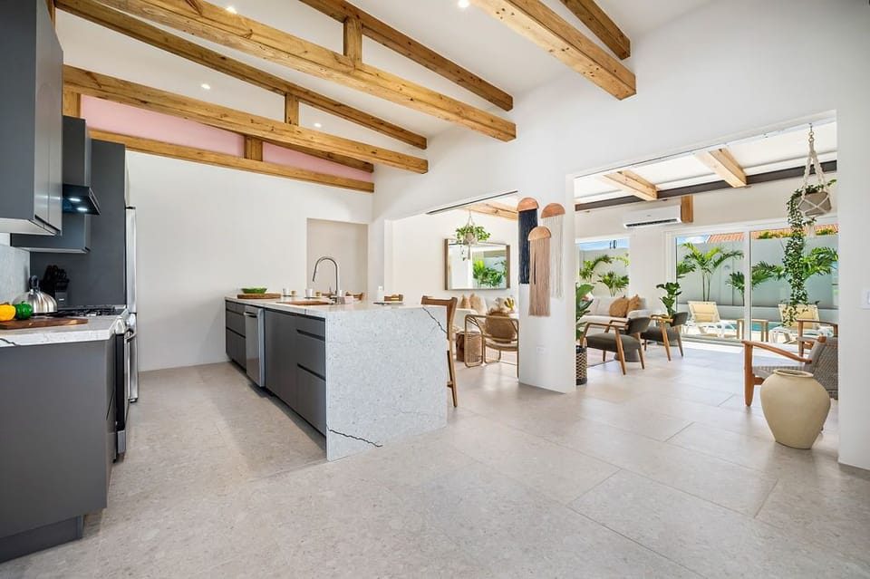 Love to cook on vacation? Our villa’s fully equipped kitchen has everything you need for your culinary creations. From modern appliances to ample counter space, this sleek, stylish kitchen is perfect for whipping up delicious meals.