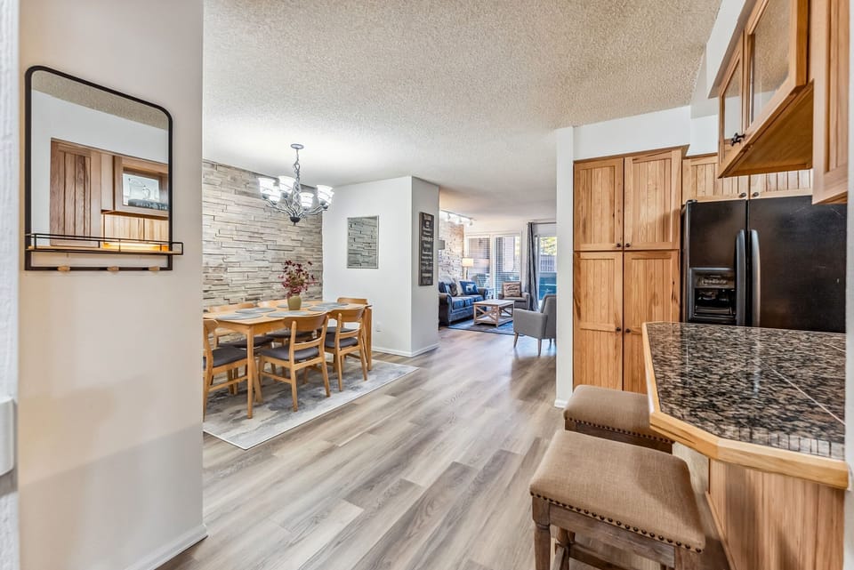 Kitchen & Dining Room: Open layout, well-equipped kitchen, kitchen bar w/2 bar stools 6-person dining table
