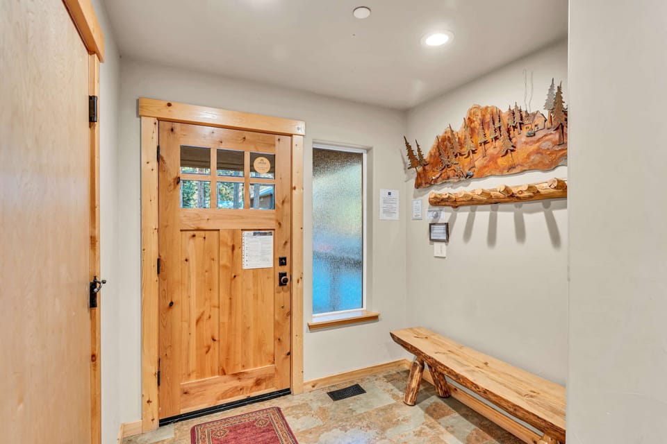 Entryway: Bench, coat hooks, access via attached garage or front door, ground floor