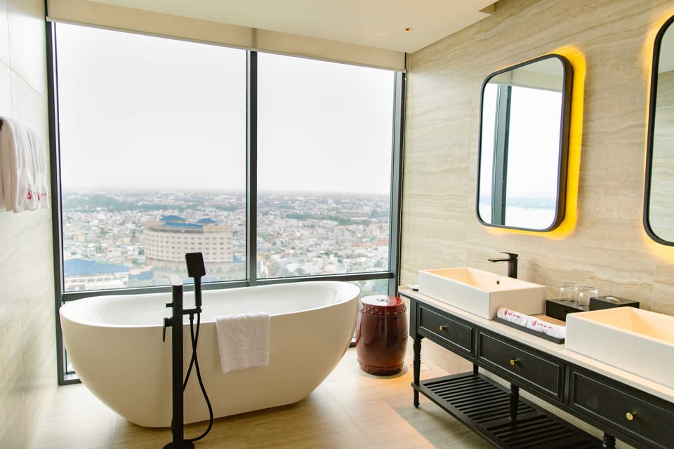 King Suite Room, River View | Bathroom | Shower, free toiletries, hair dryer, bathrobes