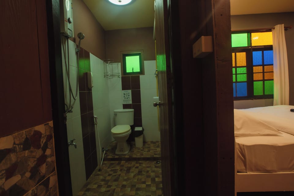 Standard Triple Room | Bathroom | Rainfall showerhead, hair dryer, towels, shampoo