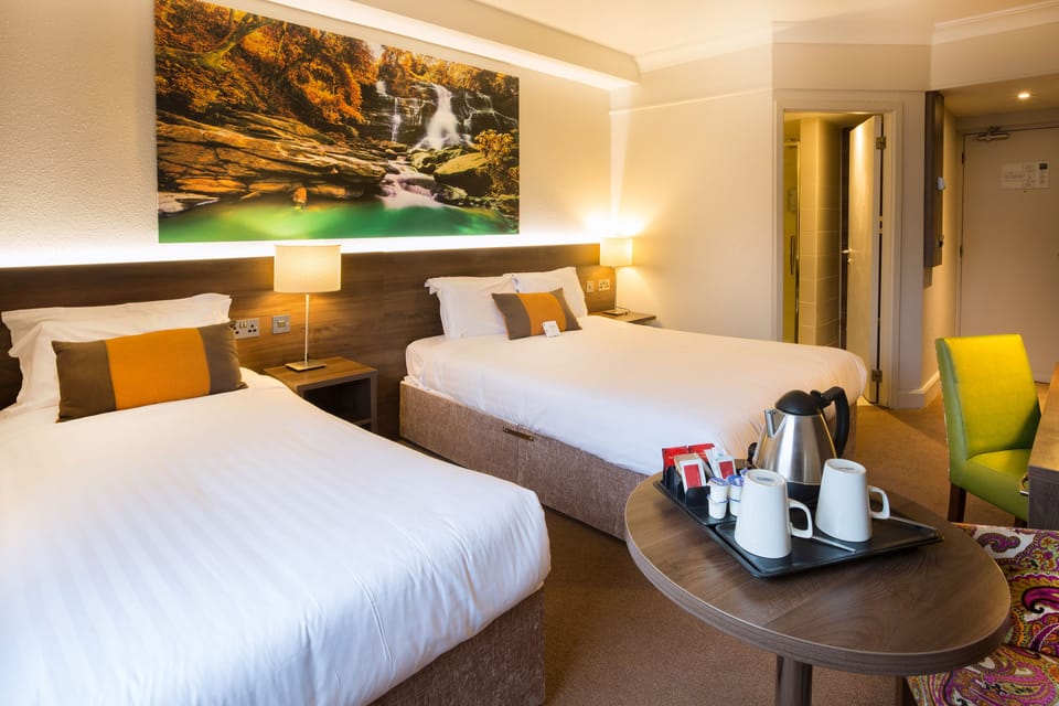 Desk, travel crib, free WiFi, bed sheets
