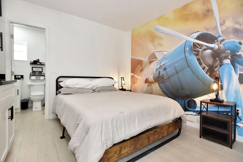 Queen bed with a newly renovated space with exciting decor