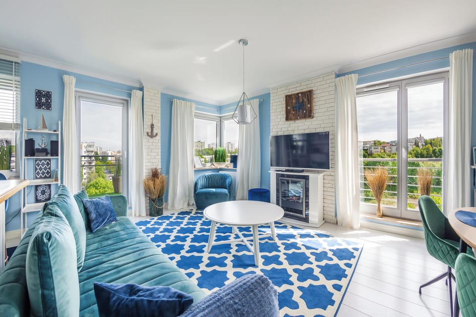Apartament (112F/27) | Living area | Flat-screen TV