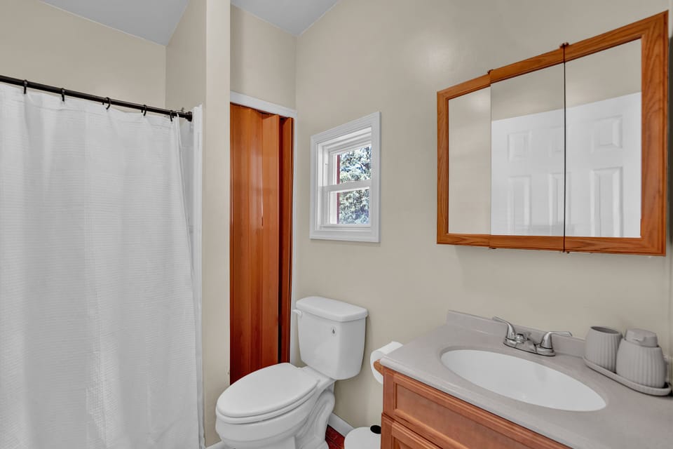 Refresh and unwind in the full upstairs bathroom.
