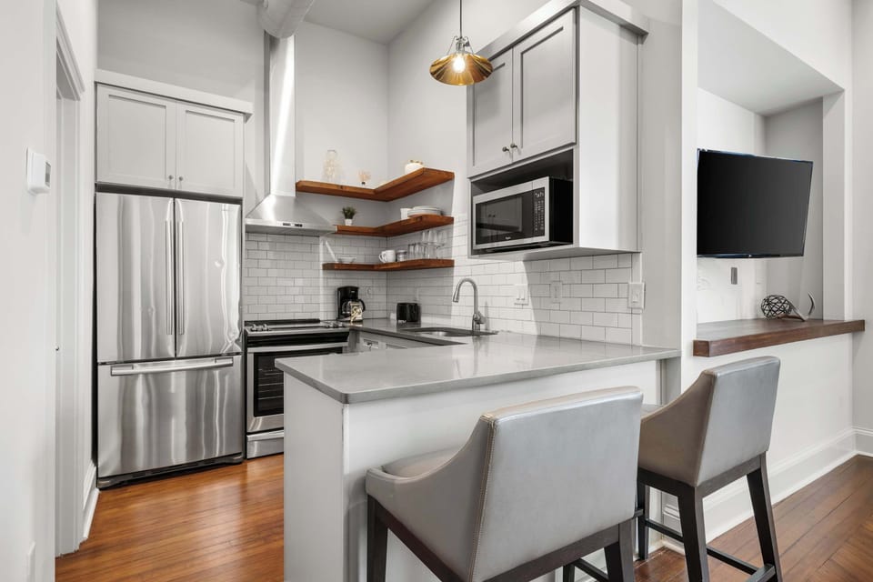 Fully equipped kitchen with everything you need to cook a meal with seating for two! 
