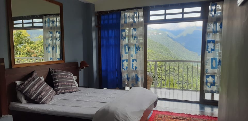 Family Double Room, Balcony, Valley View | Desk, laptop workspace, individually furnished