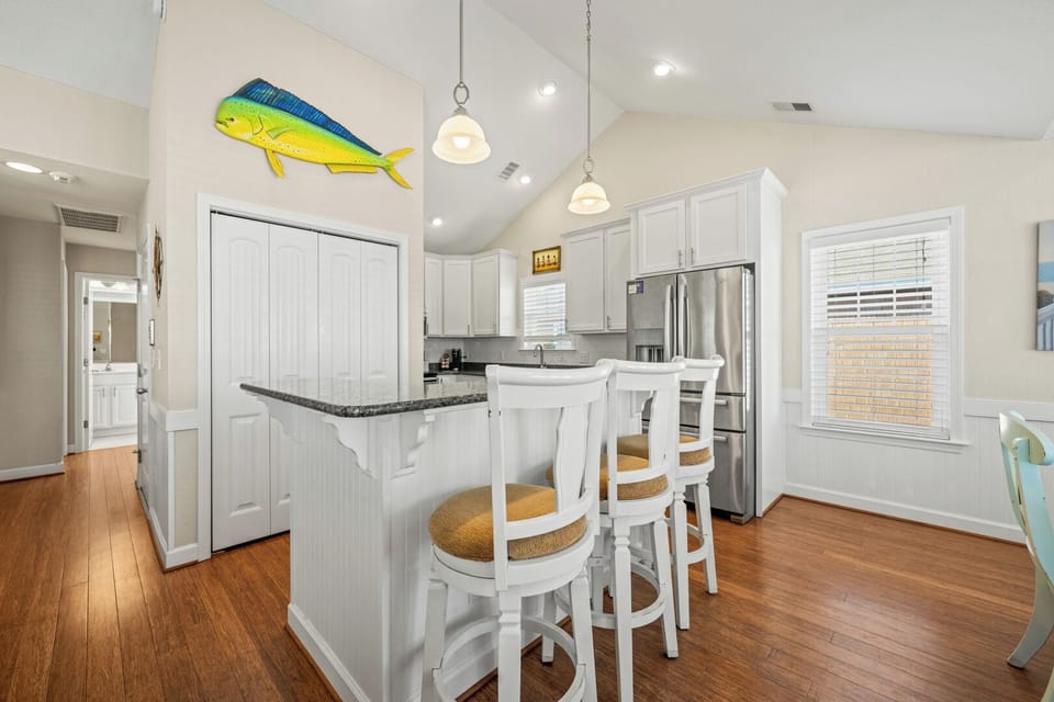 Kitchen with Bar Stool Seating on Third Level