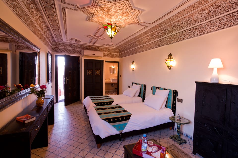 Signature Suite, Non Smoking | Premium bedding, in-room safe, blackout drapes, individually decorated