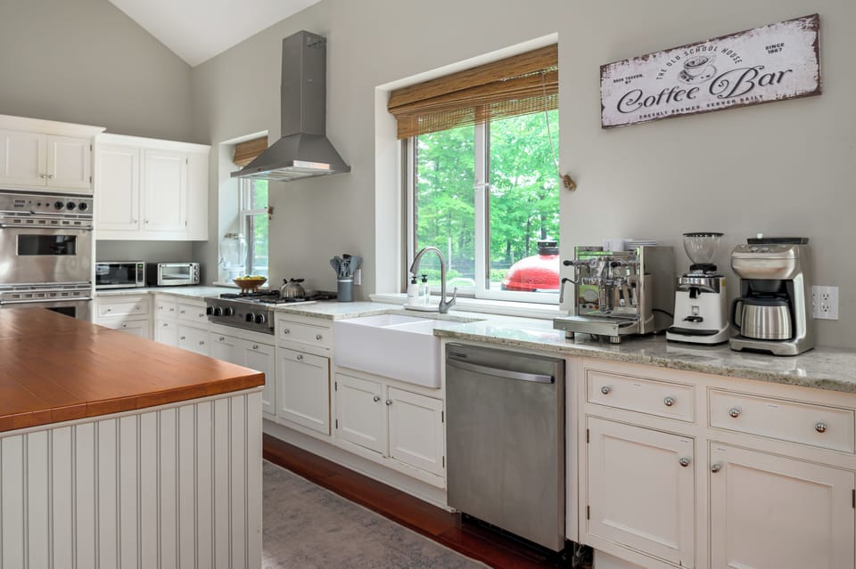 Designed for ease and gathering, the kitchen is both a place to prep and a place to pause.