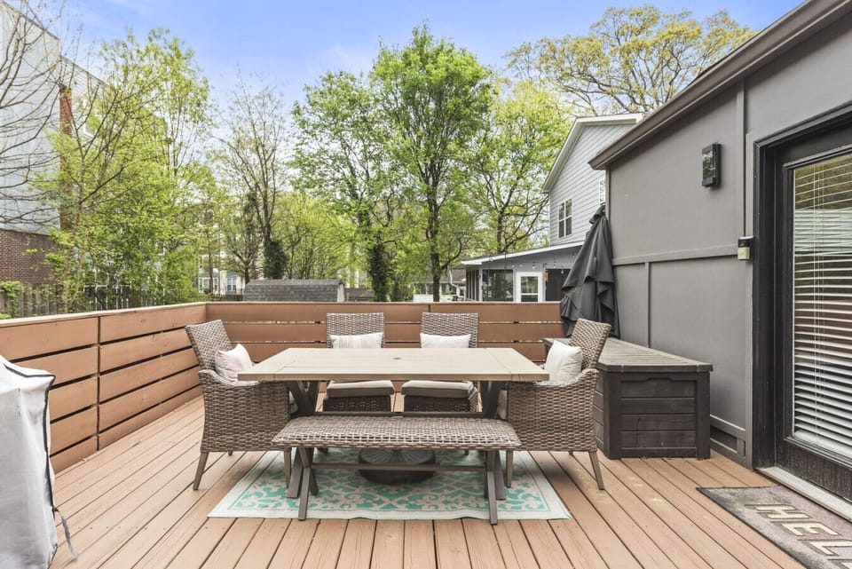 Outdoor dining area beside the hot tub