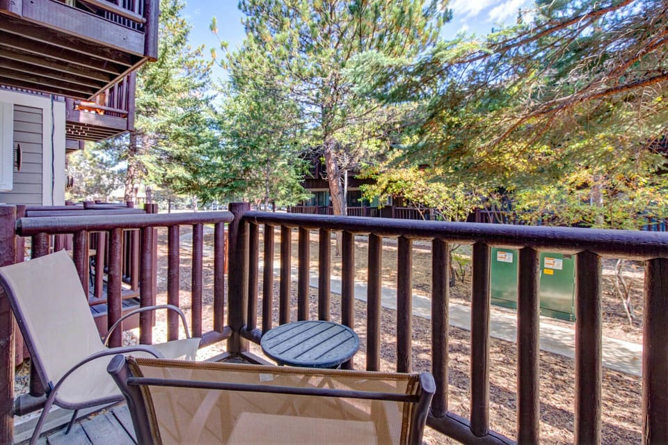 Step onto your private balcony and soak in the peaceful, tree-lined setting—perfect for morning coffee or unwinding after a day of adventure.