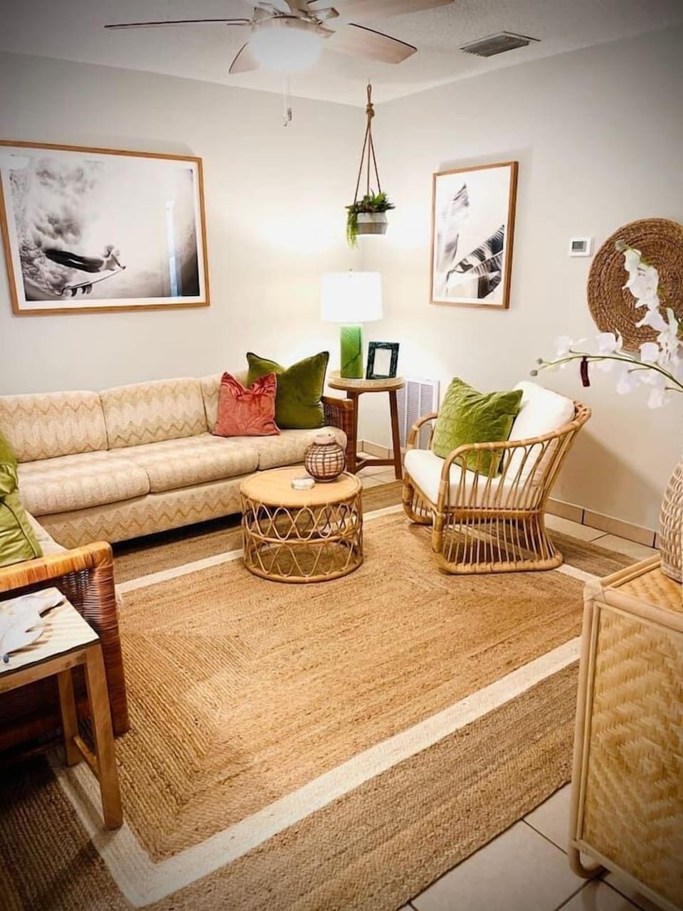 Relaxing living room with big screen tv to kick back while you're not exploring the town. 