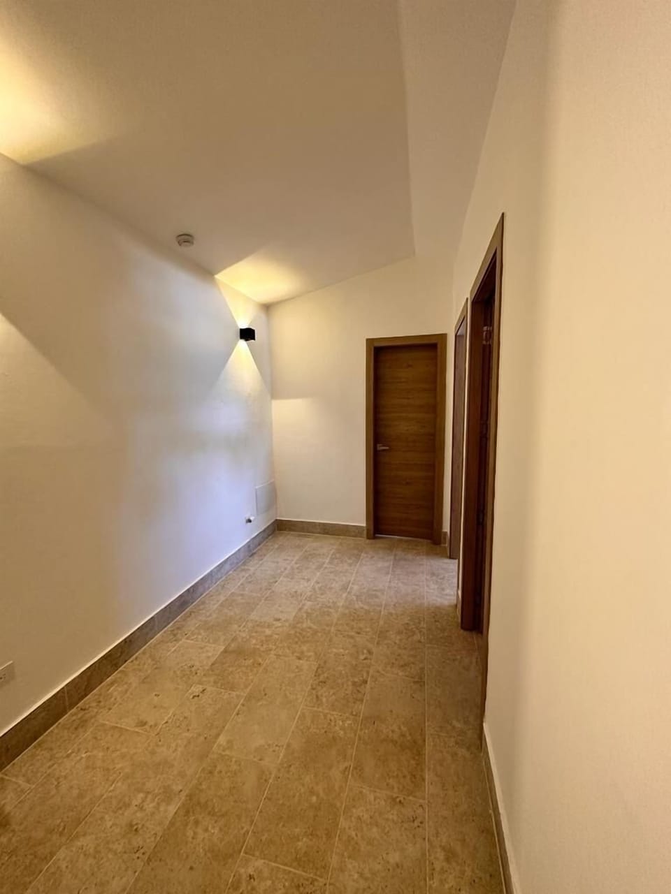 When you reach the top of the stairs, this is the second floor hallway