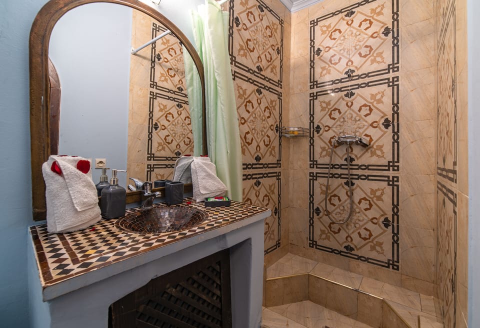 Shower, free toiletries, hair dryer, towels