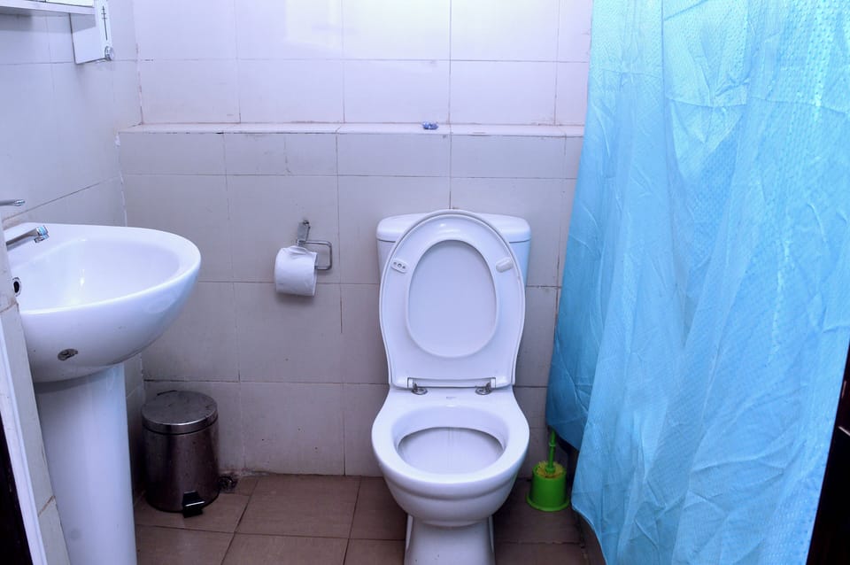 Standard Single Room | Bathroom | Towels, soap, toilet paper