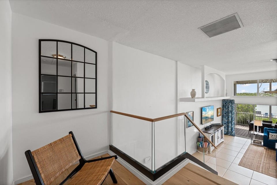 Interior - Sitting Space Overlooking the living room, deck and the water views