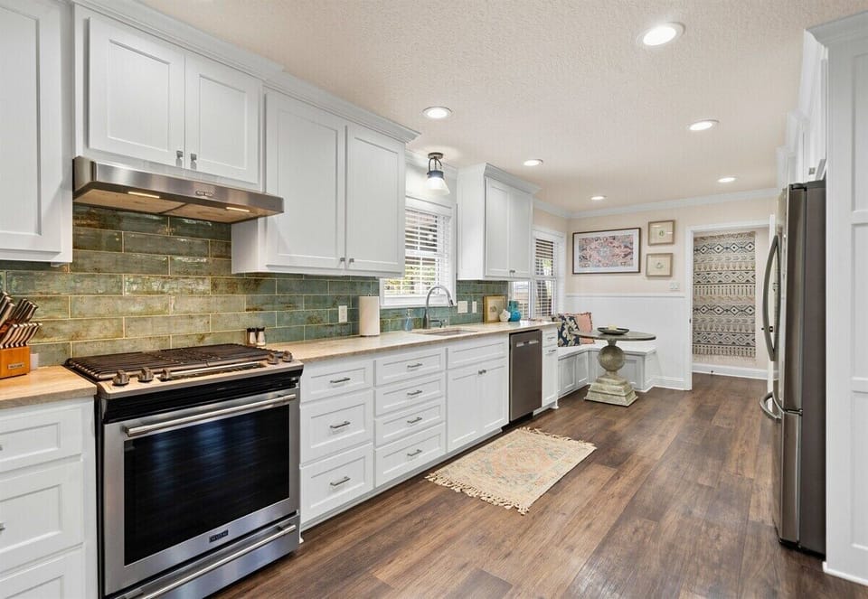 With plenty of counter space and modern appliances, this kitchen is a cook's dream, ready for any culinary adventure.