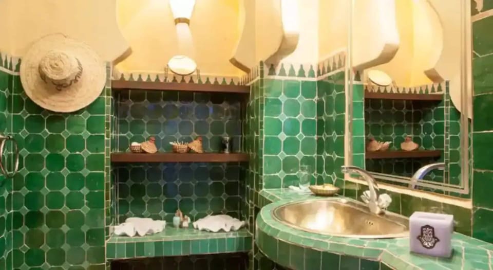 Designer toiletries, hair dryer, towels