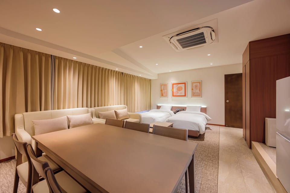 Family Quadruple Room, Multiple Beds, City View | Blackout drapes, free WiFi, bed sheets