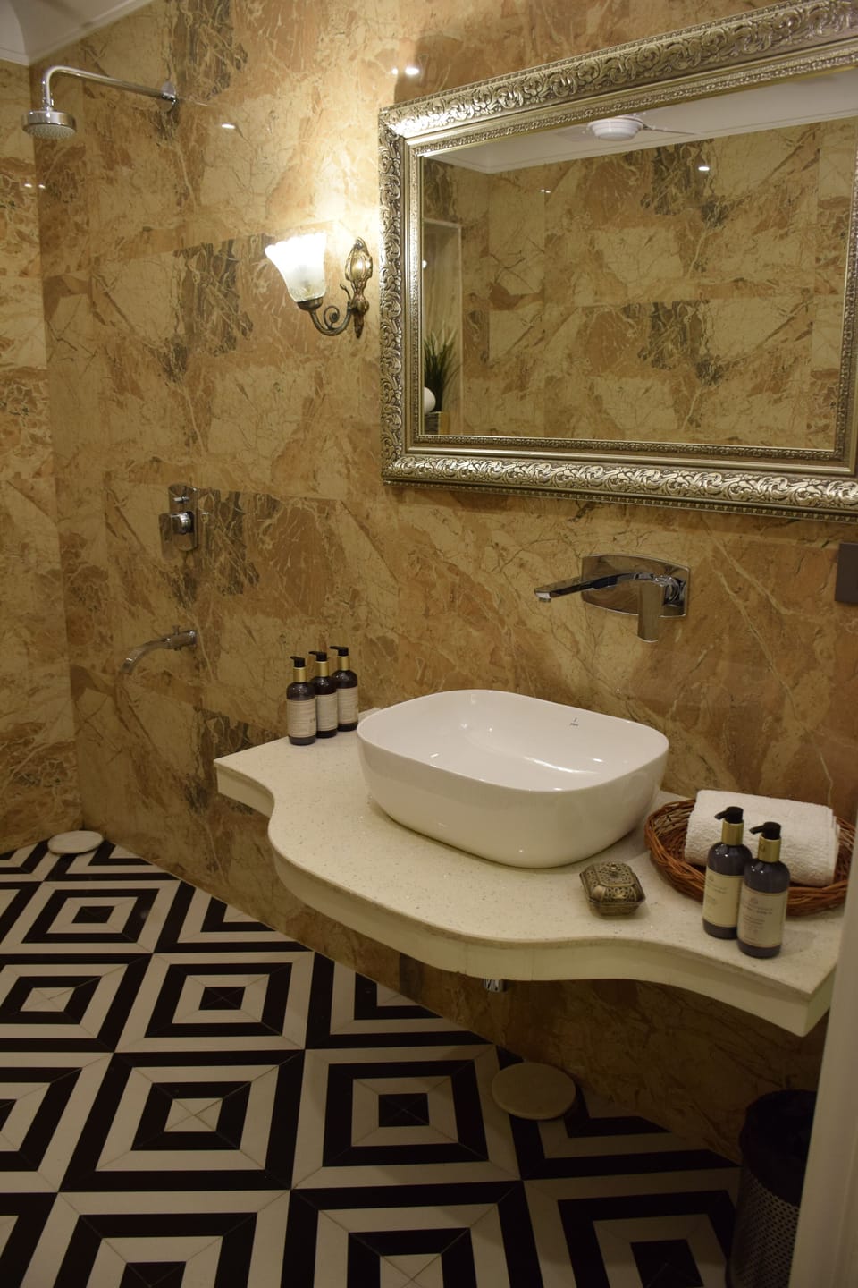 Shower, hair dryer, slippers, towels