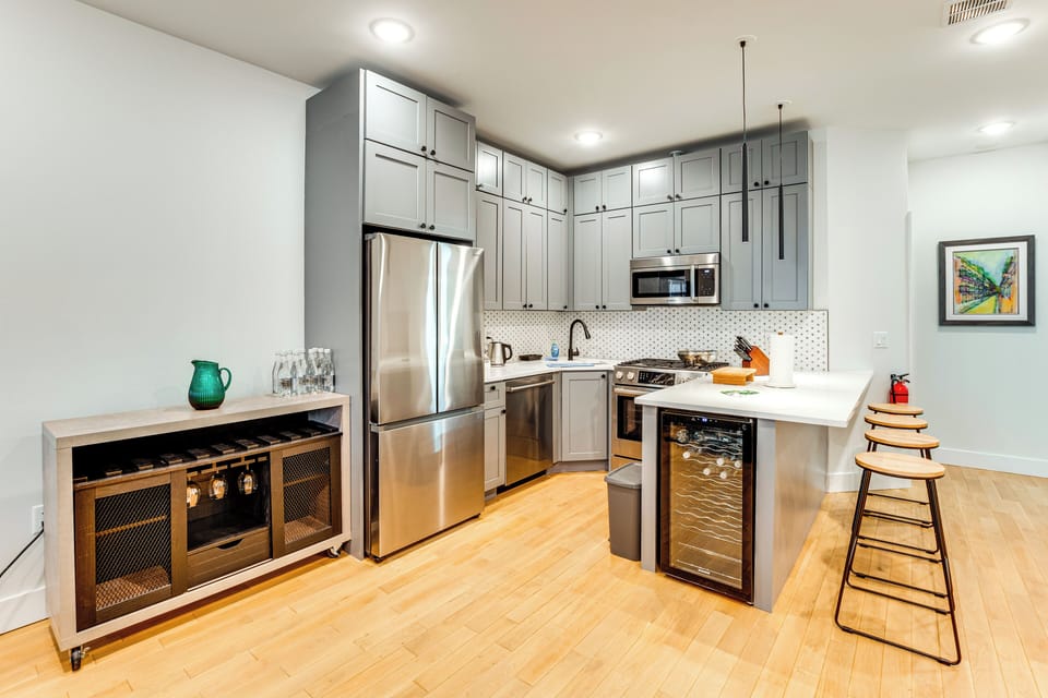 Kitchen | Drip Coffee Maker | Wine Refrigerator | Cooking Utensils | Dishwasher