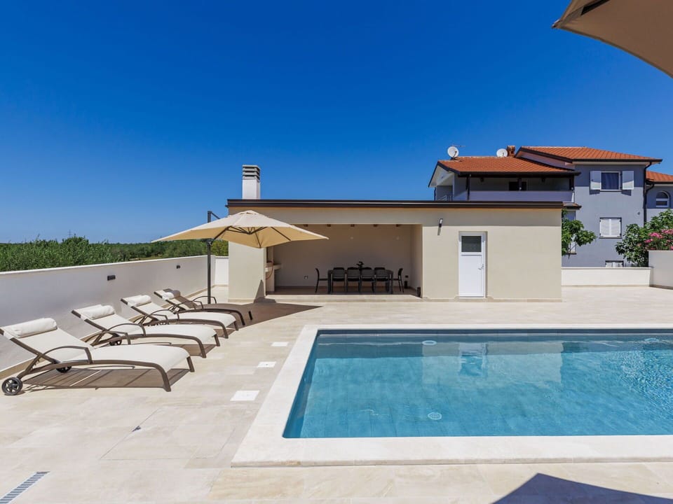 Swimming Pool, Architecture, Flooring, Resort, Composite Material, Home, Floor, Outdoor Furniture, Estate, Chair