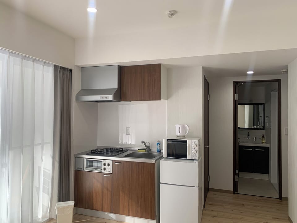Business Suite, 2 Bedrooms, Garden View | Private kitchen | Fridge, microwave, stovetop, cookware/dishes/utensils