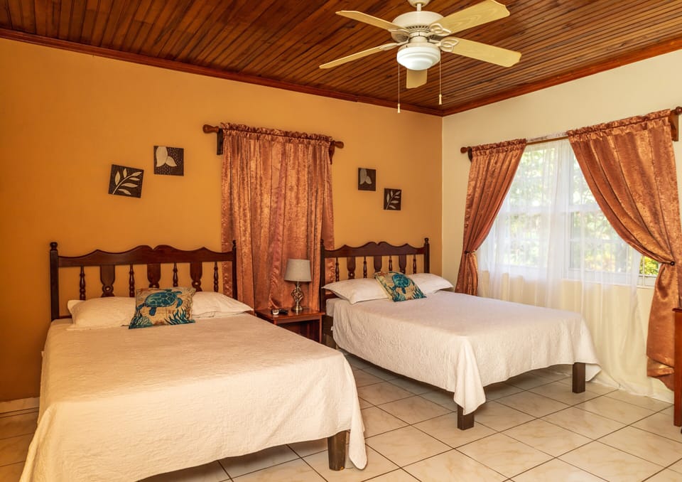 Basic Double Room, Garden View | In-room safe, desk, bed sheets