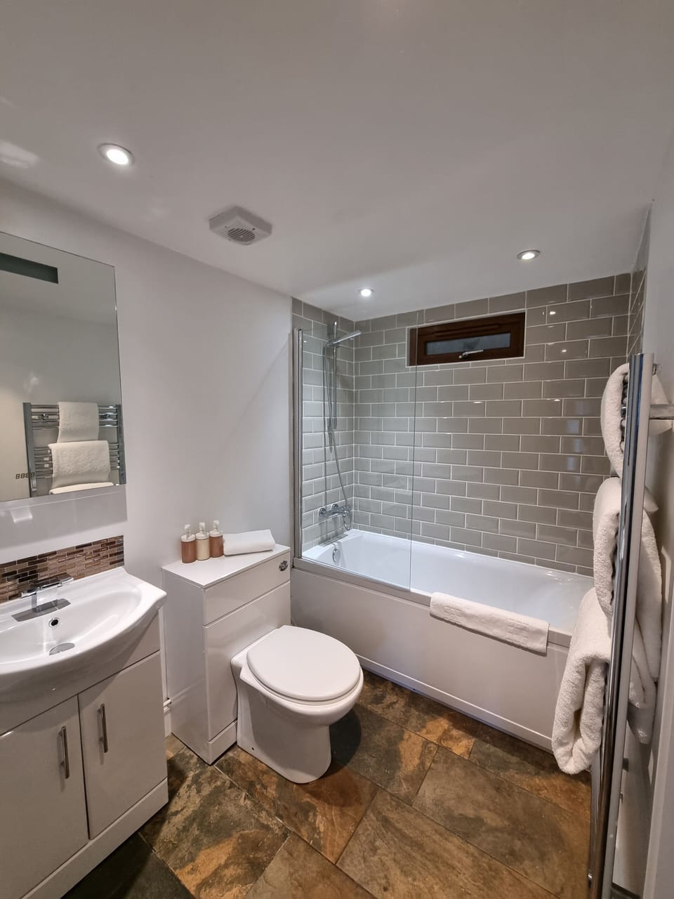 Hair dryer, towels, soap, shampoo