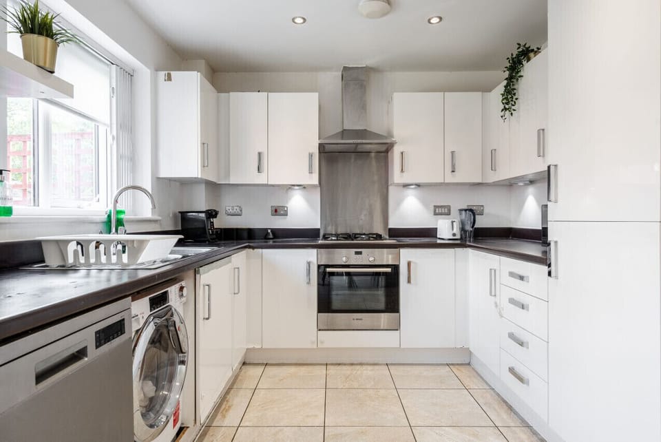 Kitchen. Fully equipped with cooking equipment perfect for families. Appliances such as fridge freezer, microwave, cooker, oven, dishwasher Toaster are free and available for your use.