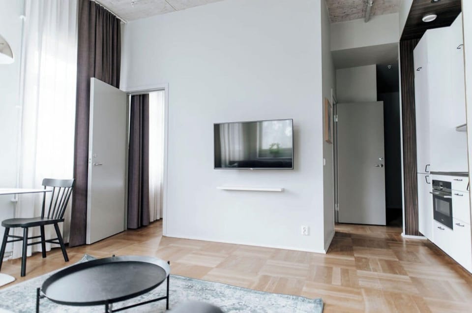 Apartment, 1 Bedroom, Kitchenette | Desk, iron/ironing board, WiFi (free), bed sheets