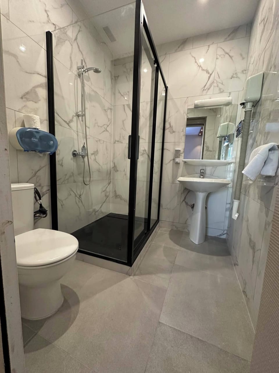 Standard Triple Room, City View | Bathroom | Shower, hair dryer, bidet, soap