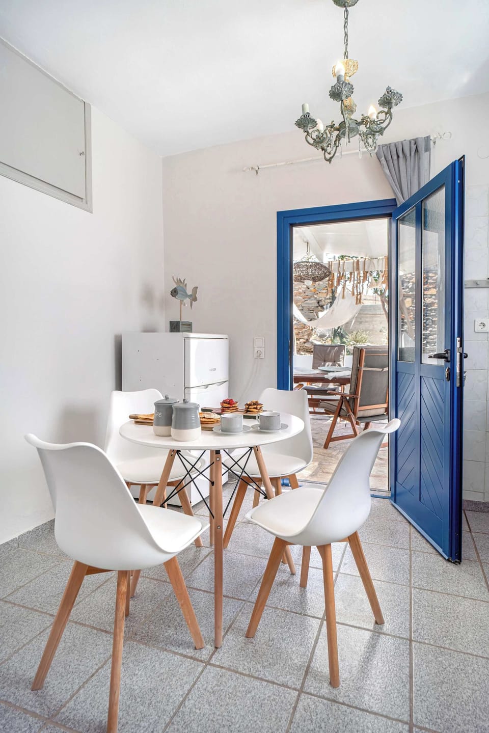 Bright dining space with a modern island aesthetic