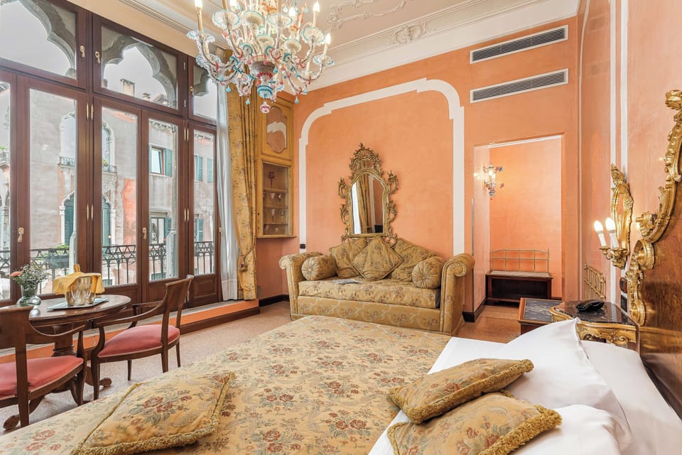 Luxury Room, Balcony, Canal View | Hypo-allergenic bedding, down comforters, minibar, in-room safe