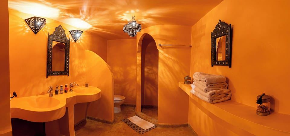 Signature Quadruple Room | Bathroom | Shower, free toiletries, towels